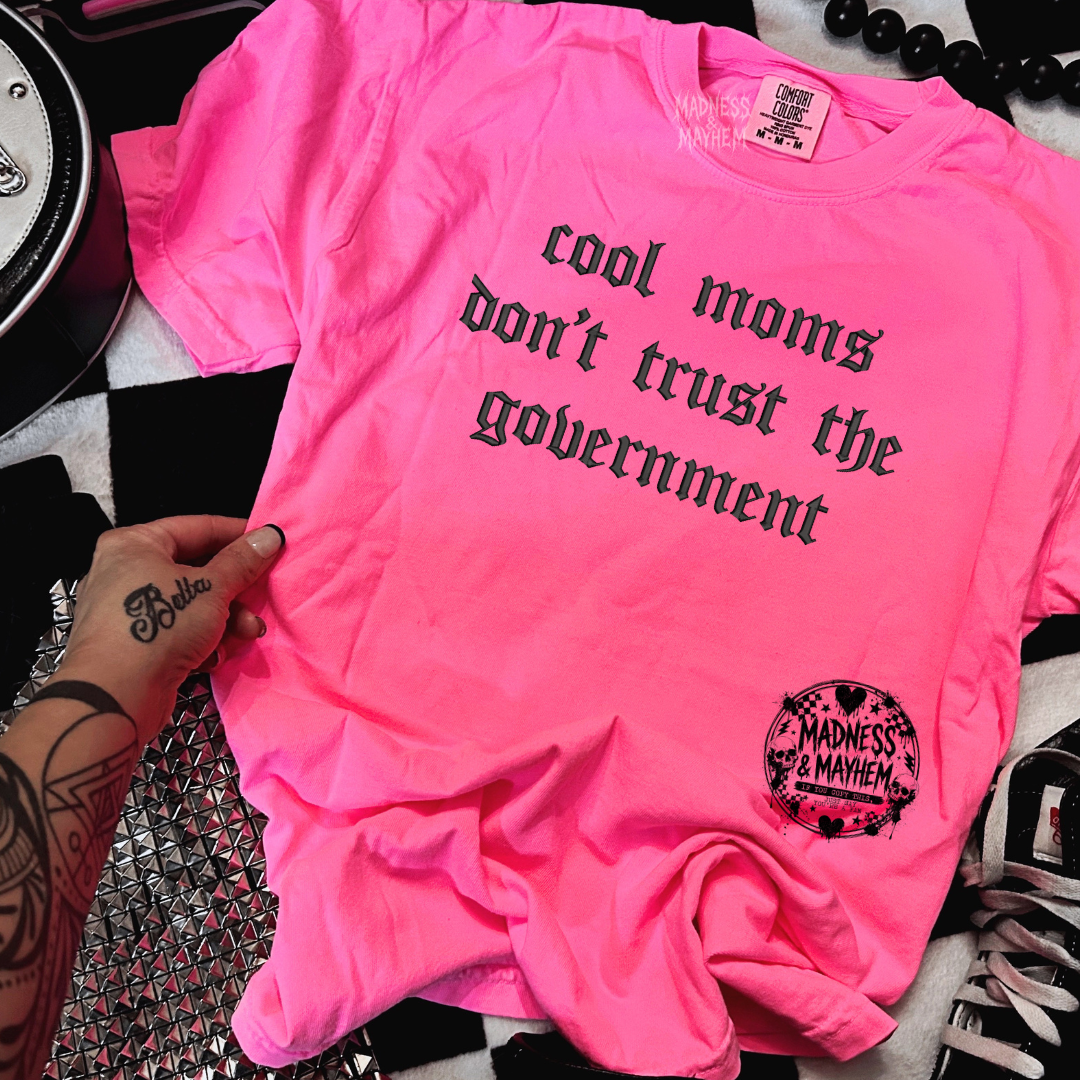 Neon pink cool moms don’t trust the government embroidered tshirt