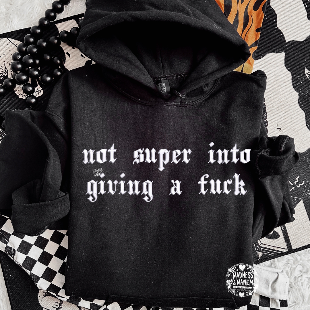 not into giving a fuck Embroidered Hoodie