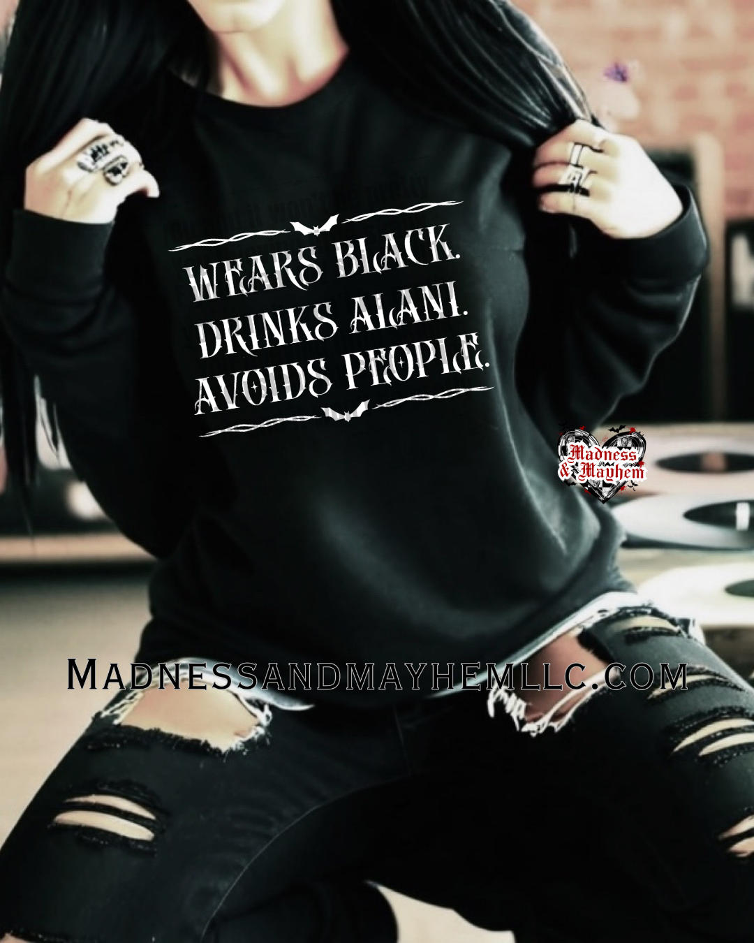 Wears black Alani crew neck sweatshirt